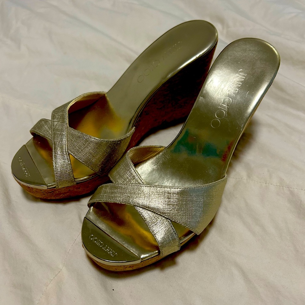 Gold Jimmy Choo sandals.  Just got them. Tried on only. A bit snug for my toes.